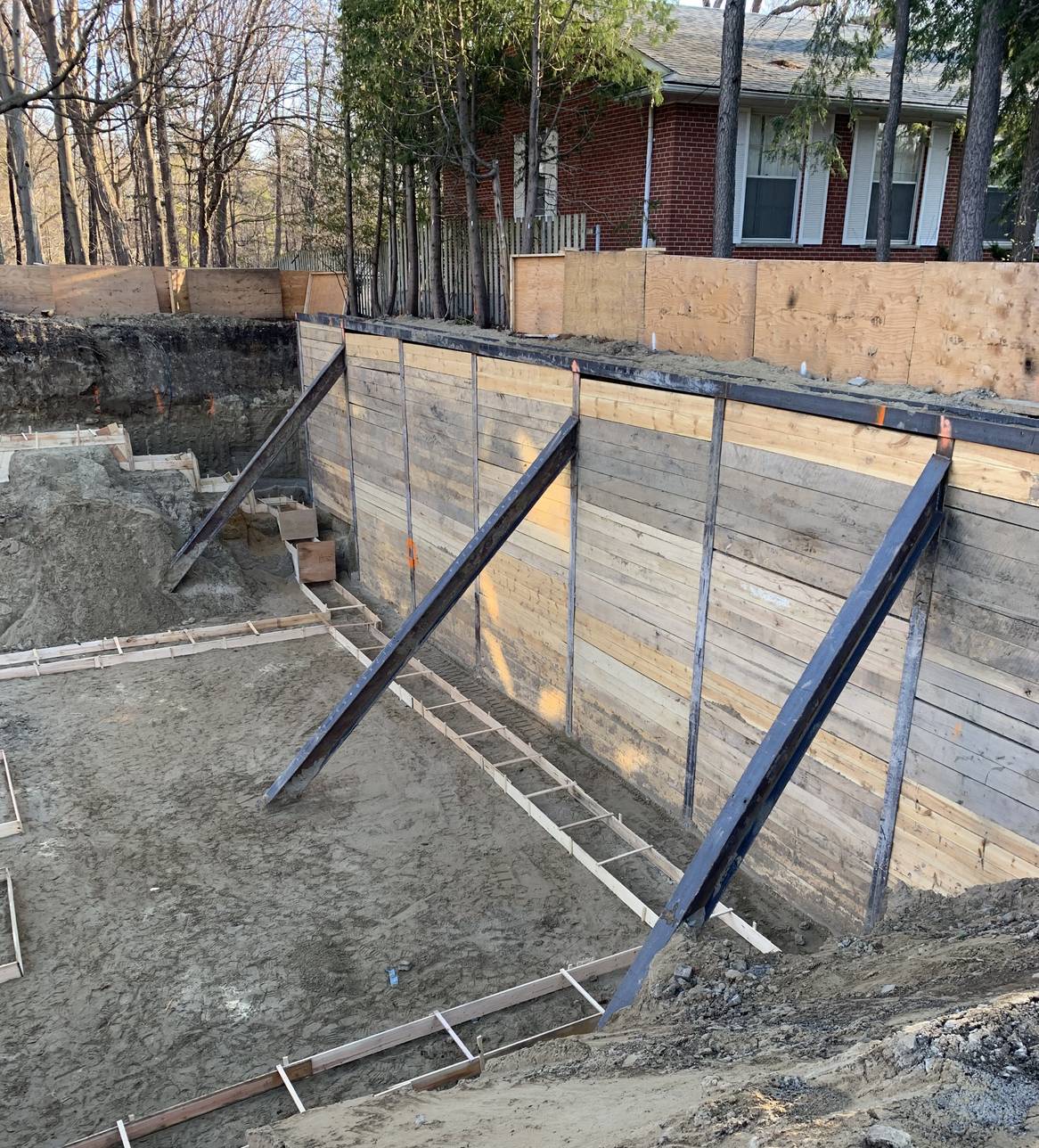 Internal steel bracing system installed to stabilize a deep excavation site in Scarborough, Toronto
