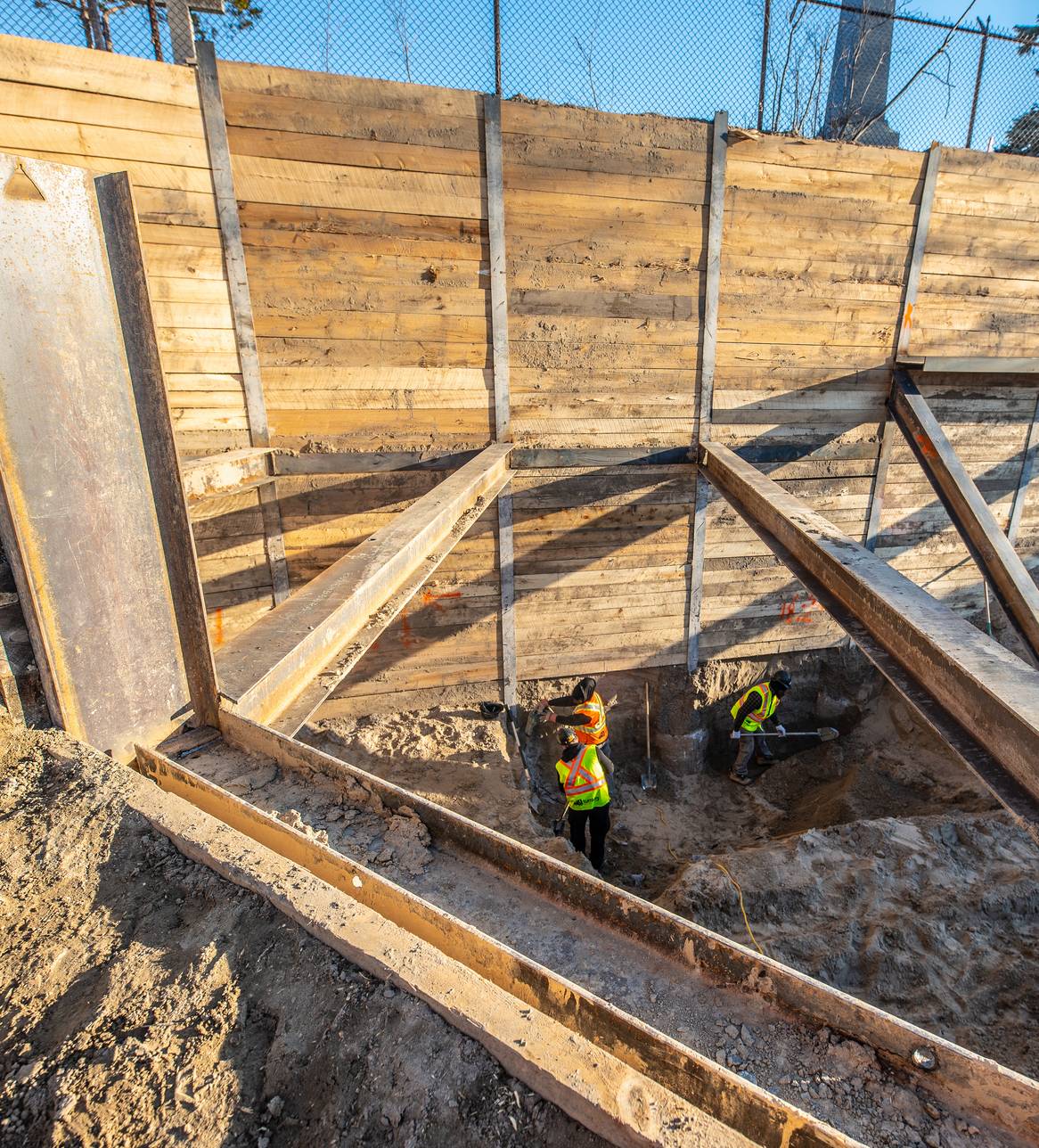 Excavation site in Toronto with internal steel bracing installed for shoring support